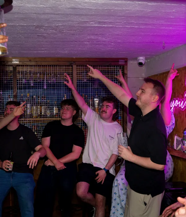 The crowd dancing at La Escuelita in the bar at The Old School Yard