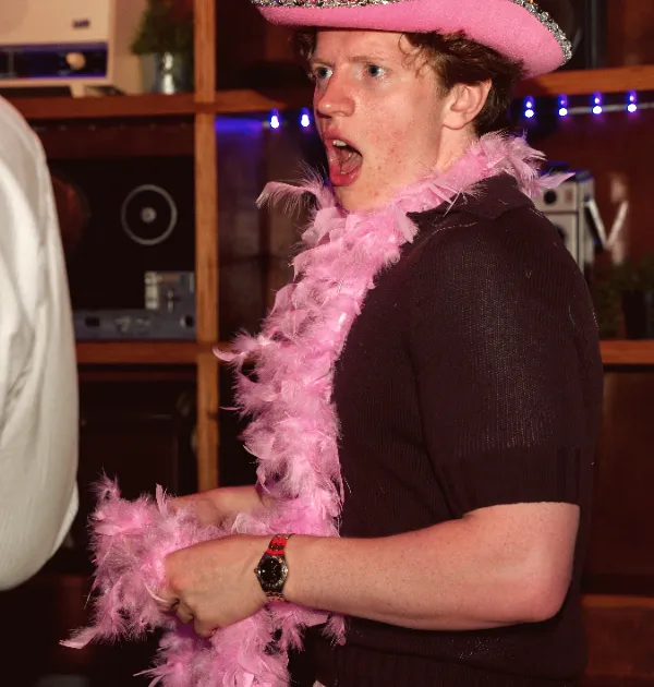 Pink hats and feather boas at La Escuelita